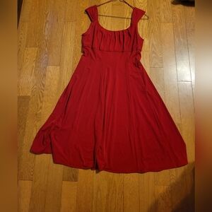 London Times red Dress. Fitted bust to accent cleavage and flare bottom